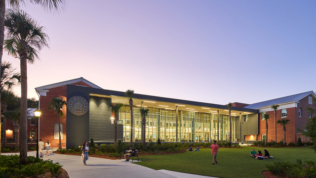 Back of Carlton Student Union Building at sunset